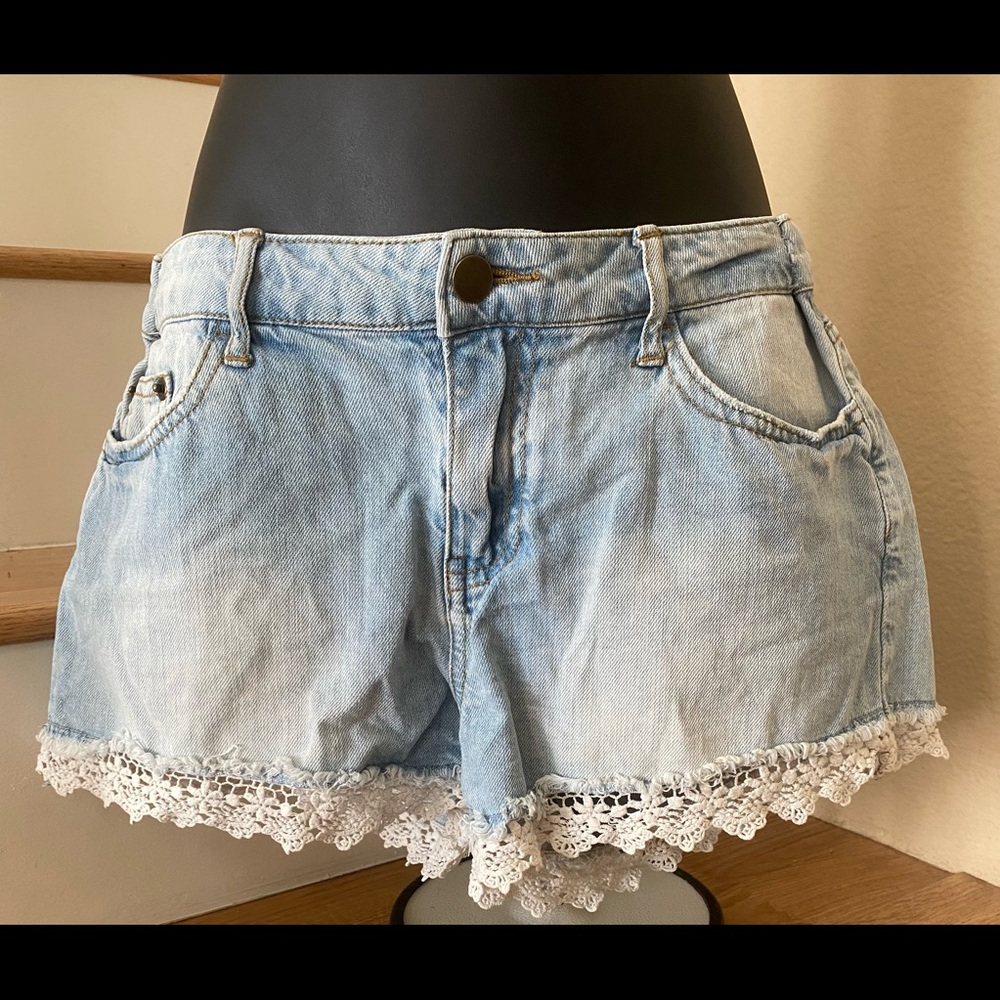 Lace trimmed jean shorts